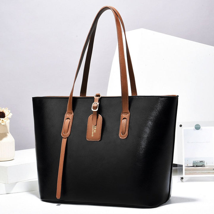 Refined Whisper Handbag
